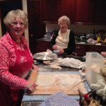 Mother & daughter making lefse